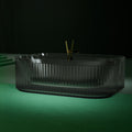 Bewater pretextbathtub Made of polyresin, with a vertically grooved outer structure, including drain fitting
